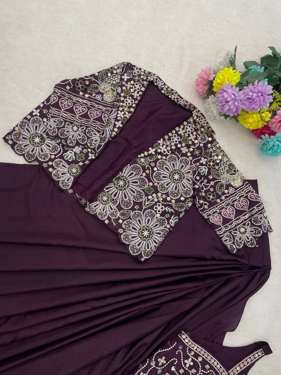 Experience effortless luxury with this premium ready-to-wear saree. Expertly tailored with precise pleats and a refined finish, it delivers a sophisticated look without compromising comfort.