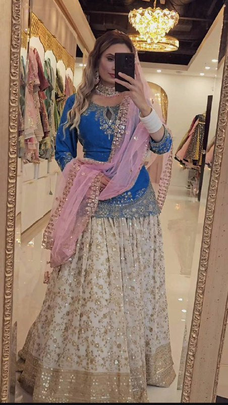 ĐĚSIGNER PARTY WEAR TOP AND LAHENGHA. WITH FANCY DUPPATA AND EMBROIDERY WORK