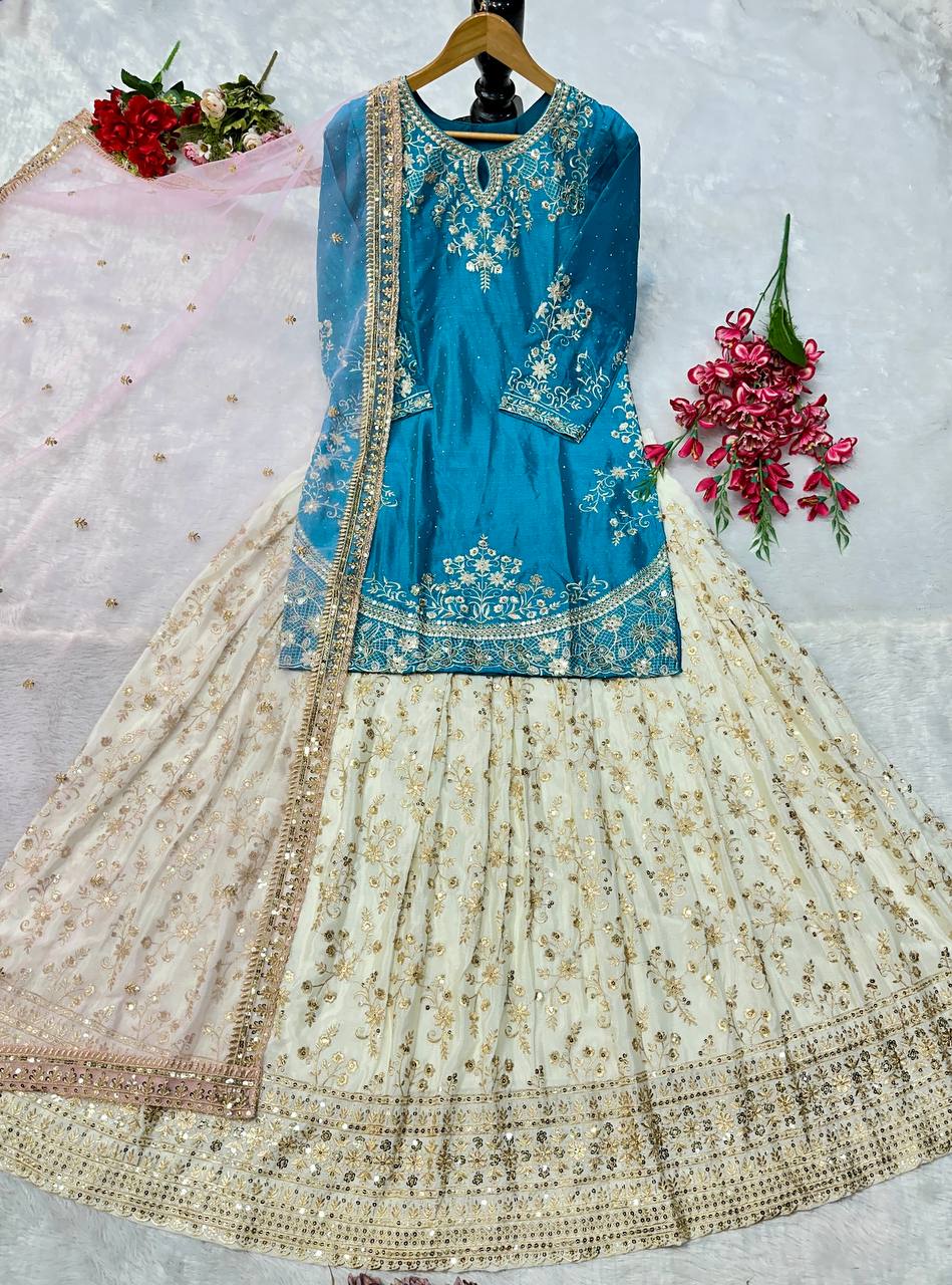 ĐĚSIGNER PARTY WEAR TOP AND LAHENGHA. WITH FANCY DUPPATA AND EMBROIDERY WORK