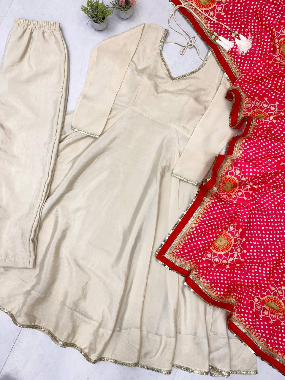 DESIGNER AND ELEGANCE GOWN IN THREE PIECE WITH PRINTED BANDHNI DUPATTA
