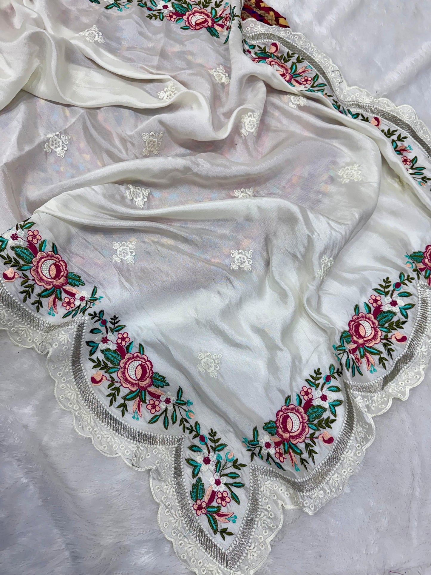 delicately designed and embroidered with floral thread work and cutwork the borders