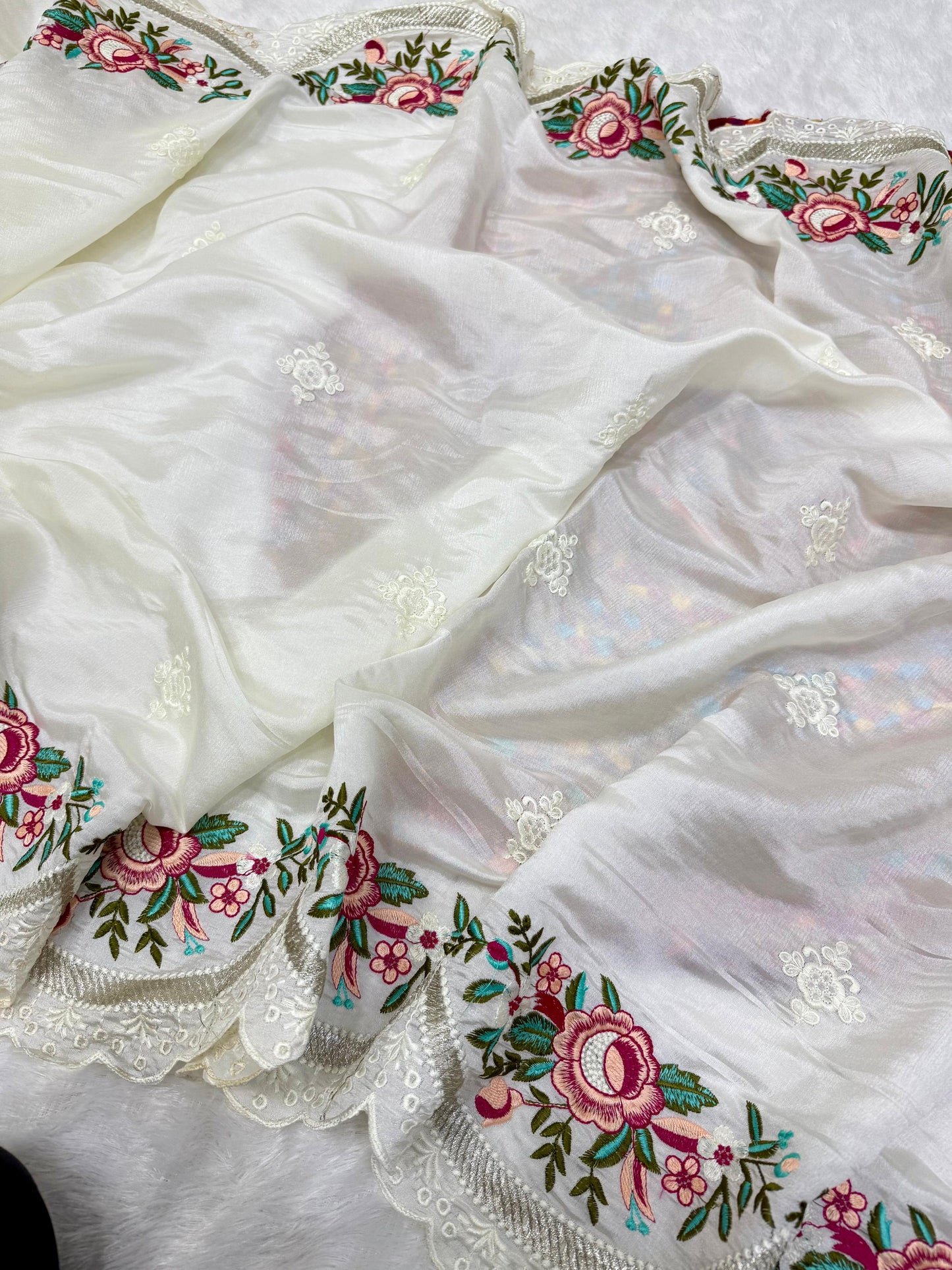 delicately designed and embroidered with floral thread work and cutwork the borders
