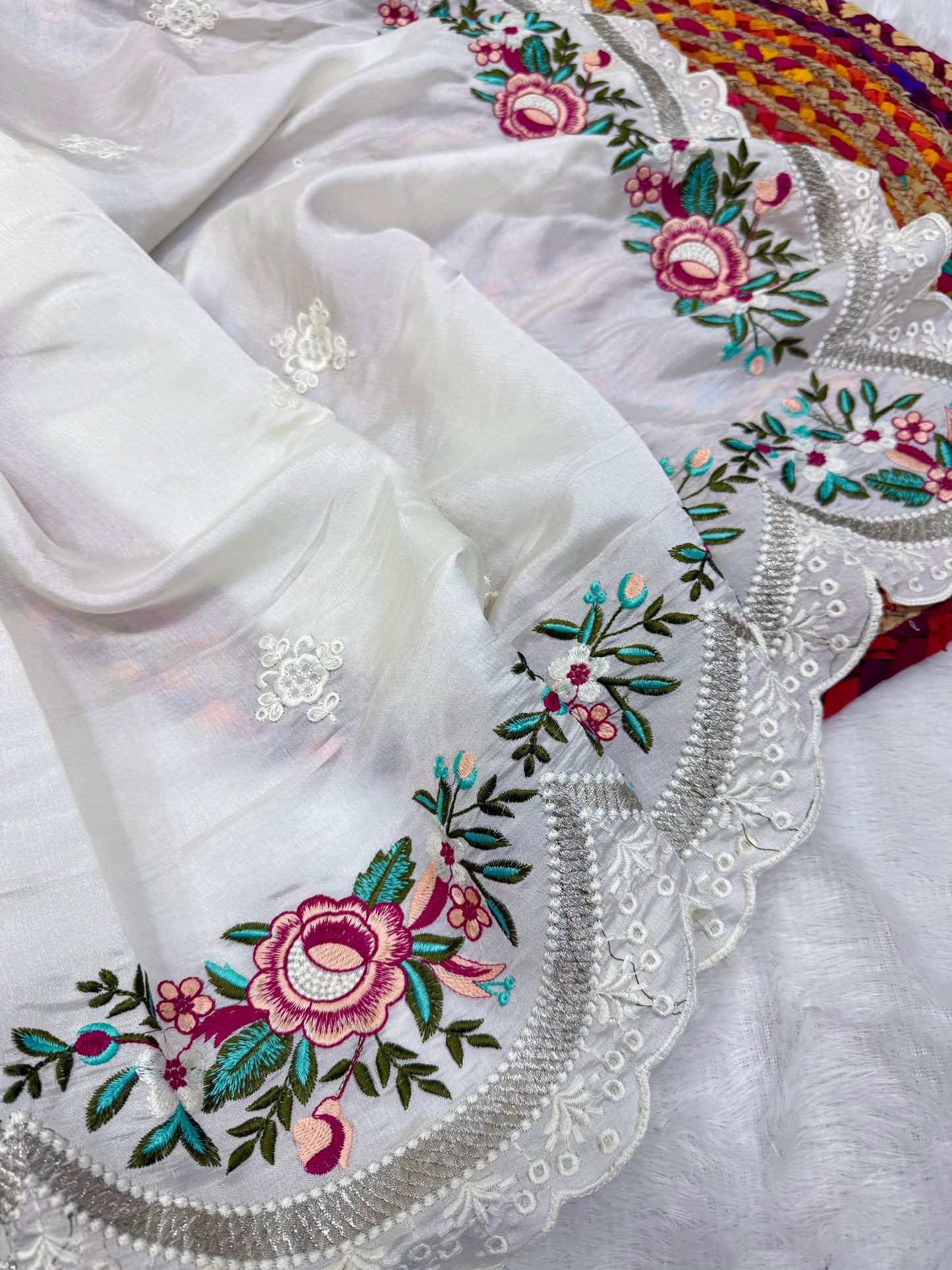 delicately designed and embroidered with floral thread work and cutwork the borders
