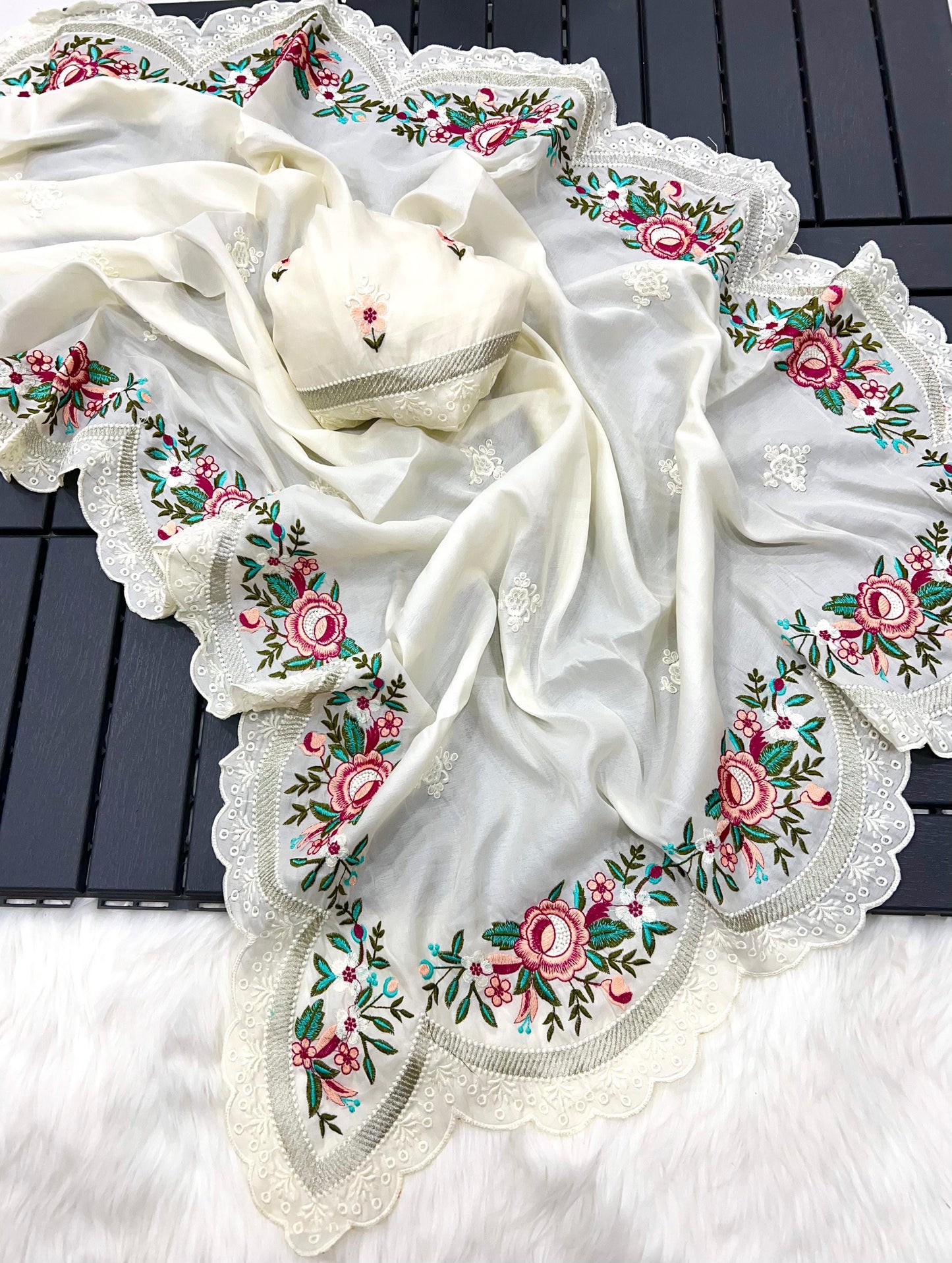 delicately designed and embroidered with floral thread work and cutwork the borders