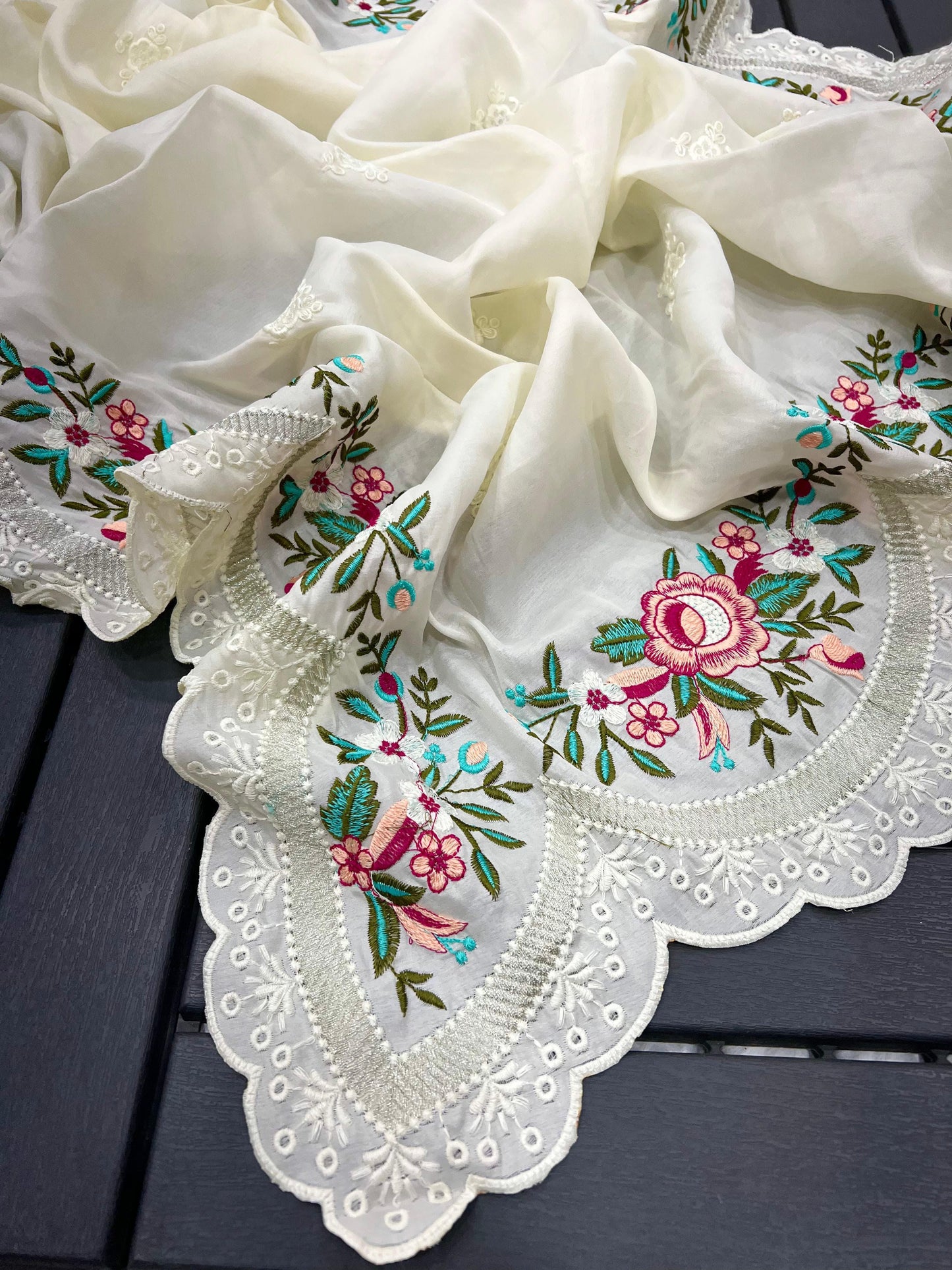 delicately designed and embroidered with floral thread work and cutwork the borders