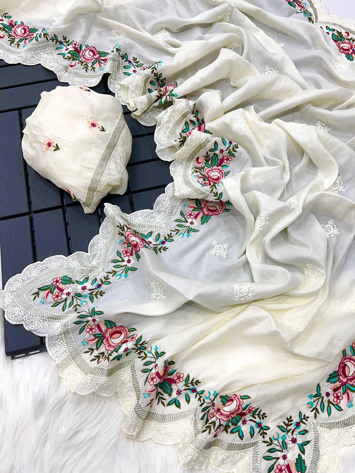 delicately designed and embroidered with floral thread work and cutwork the borders