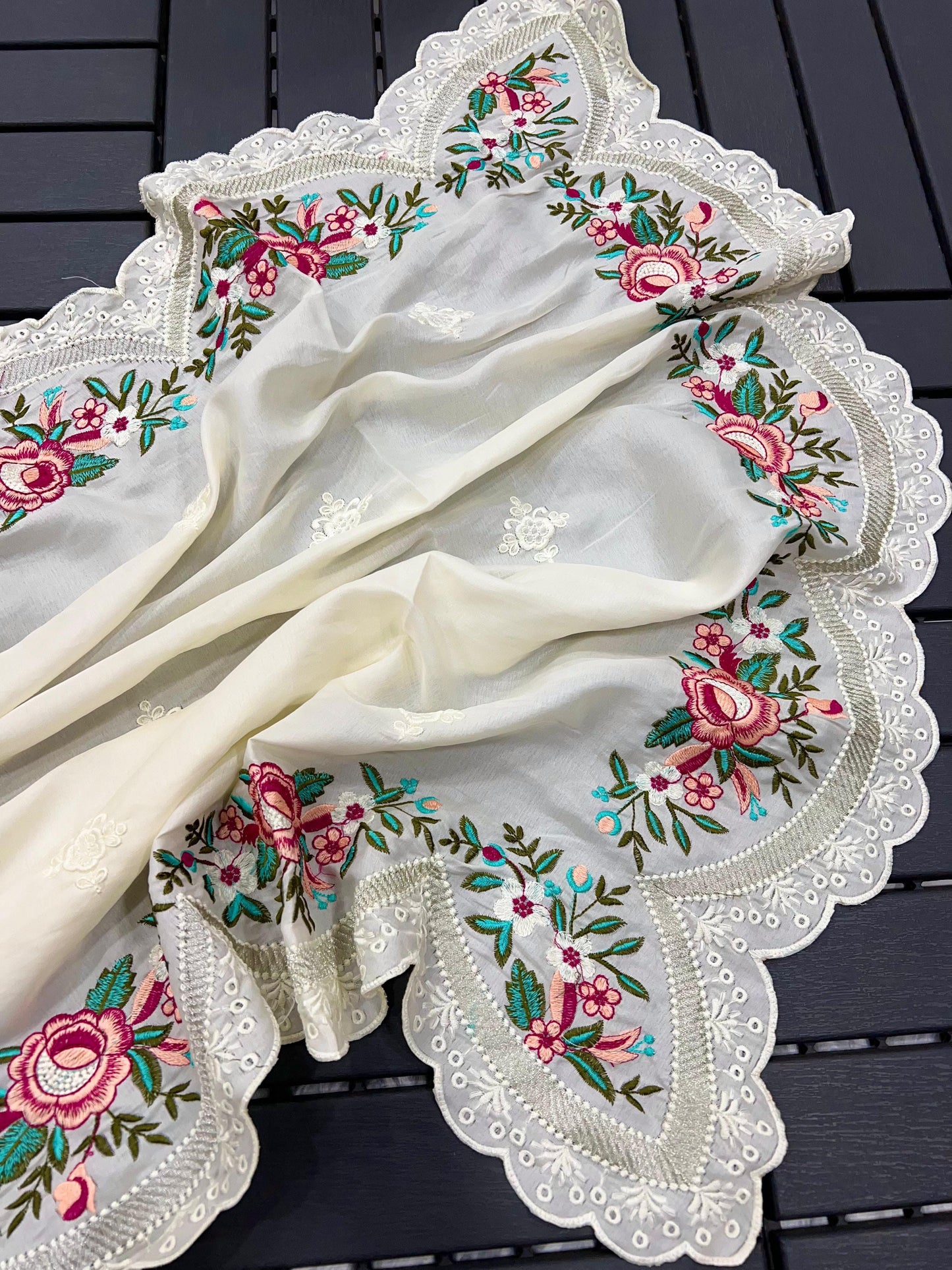 delicately designed and embroidered with floral thread work and cutwork the borders