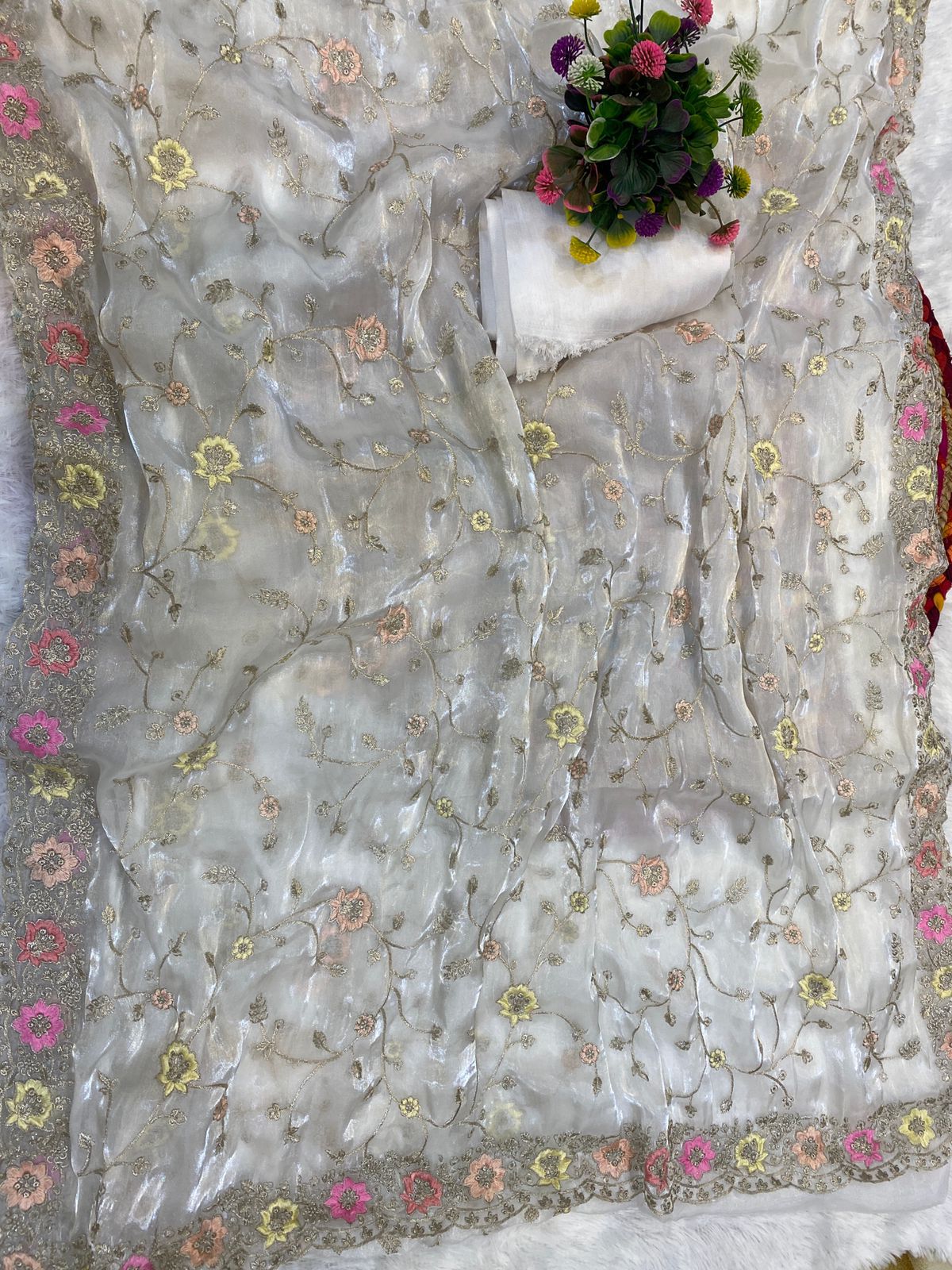 jimmyChoo fabric delicately crafted with multicolored thread and zaridori embroidery