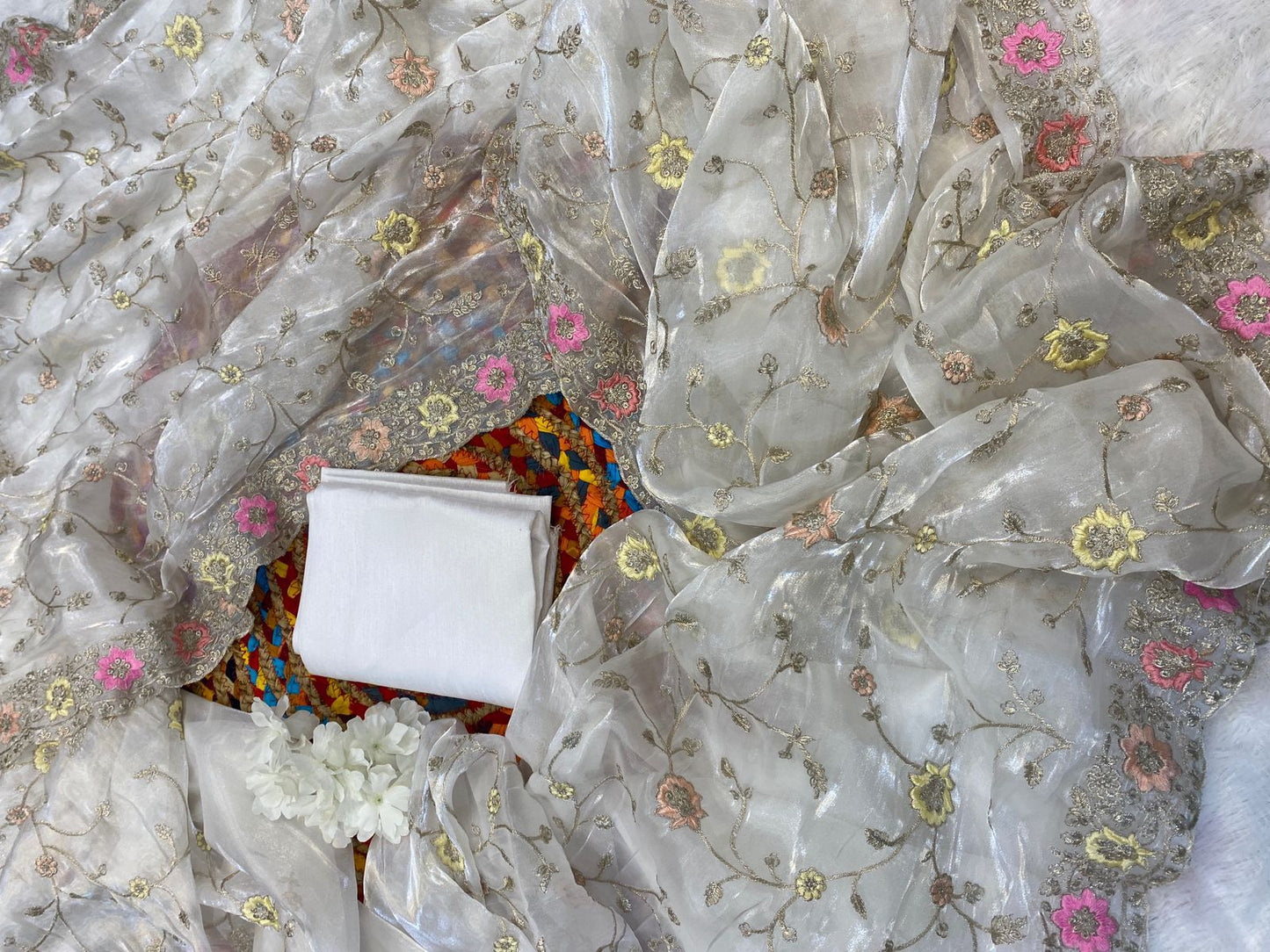 jimmyChoo fabric delicately crafted with multicolored thread and zaridori embroidery
