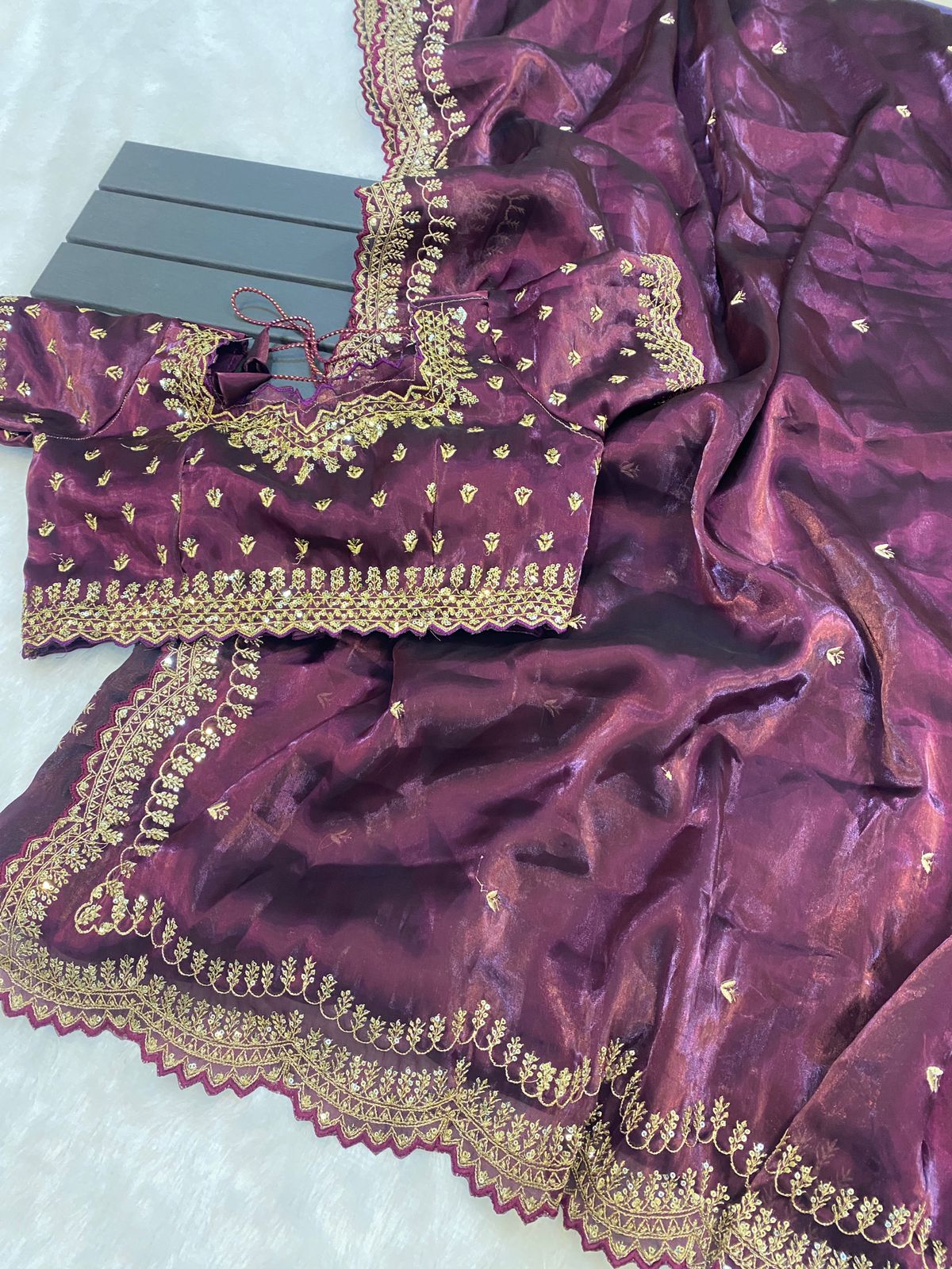 hinning pure crystal silk Jimmy choo sarees with seqnce & golden zari embroidered