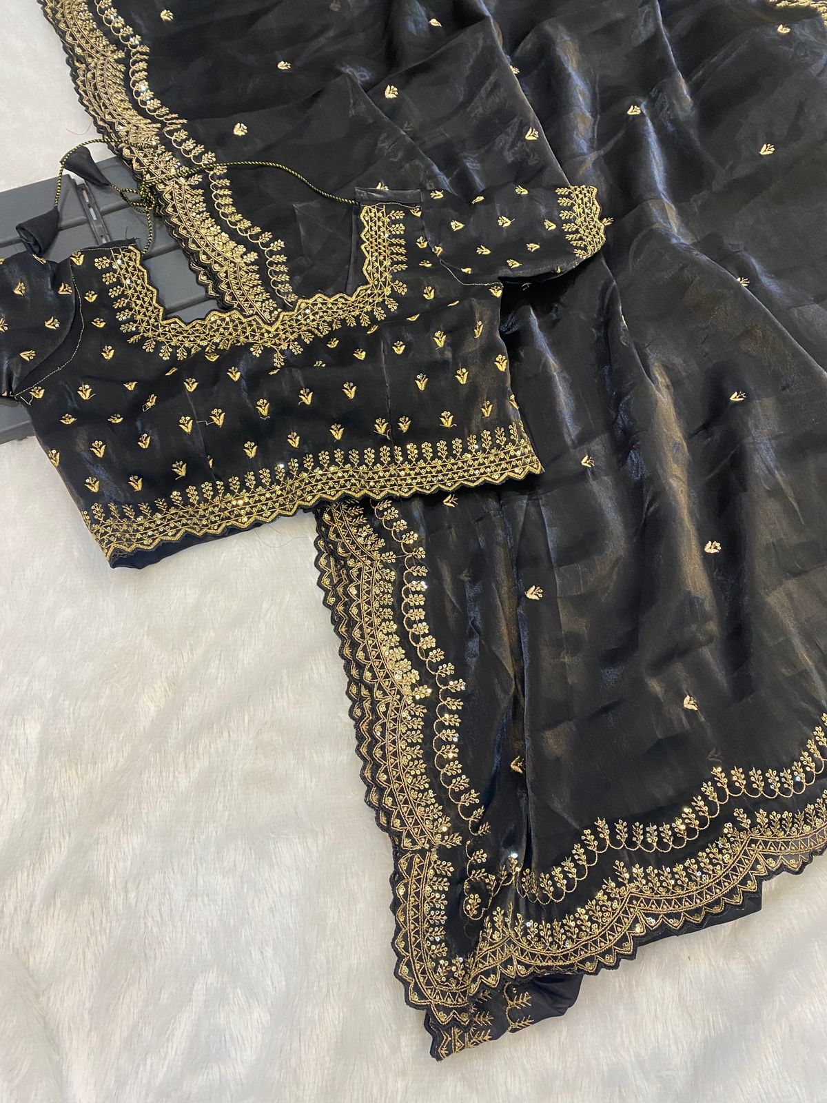 hinning pure crystal silk Jimmy choo sarees with seqnce & golden zari embroidered