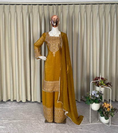 PERFECT FOR PARTY AND WEDDING OUR DESIGNER WEAR CORDING SEQUENCE EMBROIDERED TOP PLAZZO AND DUPATTA IN CHRUNCHY