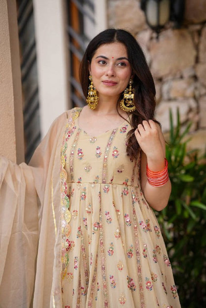 FULL FLAIR GOWN & DUPATTA WITH FULL HEAVY EMBROIDERY WORK ON SIMMER FABRIC