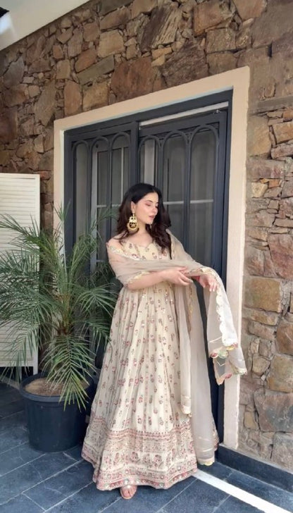 FULL FLAIR GOWN & DUPATTA WITH FULL HEAVY EMBROIDERY WORK ON SIMMER FABRIC