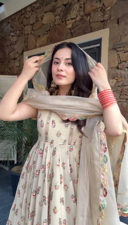 FULL FLAIR GOWN & DUPATTA WITH FULL HEAVY EMBROIDERY WORK ON SIMMER FABRIC