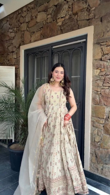 FULL FLAIR GOWN & DUPATTA WITH FULL HEAVY EMBROIDERY WORK ON SIMMER FABRIC