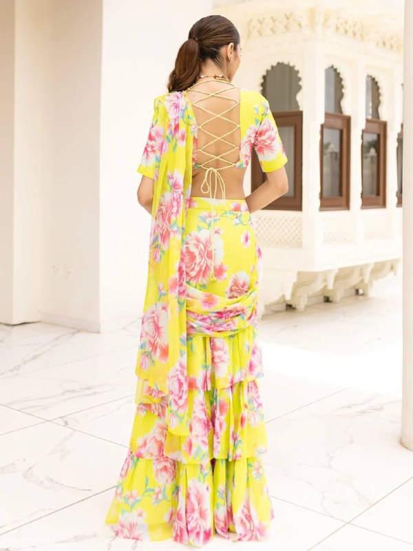 Elevate your festive and special occasion look with this stunning  Georgette Ruffle Ready To Wear Saree With Readymade Blouse Design Launch known for its lightweight feel and graceful drape  single available wholesale