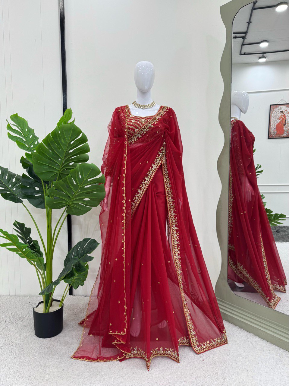 esigner Saree on Faux Georgette Febric with Thred & Sequnce wok and Blouse
