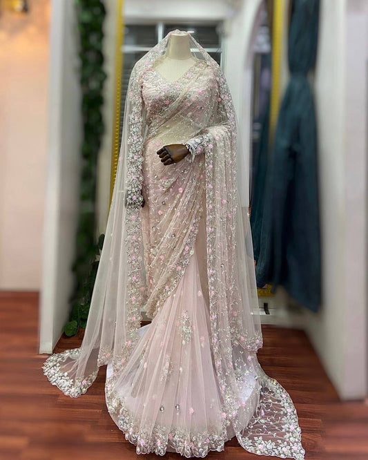 Designer Saree – Elegance Redefined ✨ Fall in love with this stunning saree in an eye-catching shade, crafted with finesse and rich detailing. A perfect blend of grace and glam!