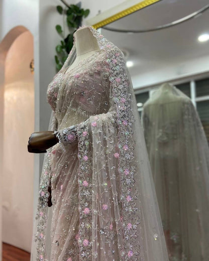 Designer Saree – Elegance Redefined ✨ Fall in love with this stunning saree in an eye-catching shade, crafted with finesse and rich detailing. A perfect blend of grace and glam!