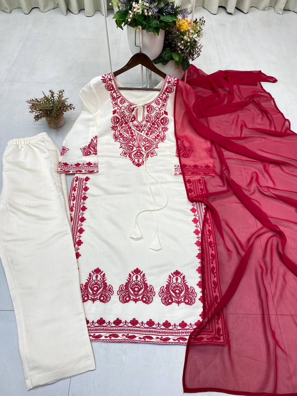 DESIGNER WEAR EXCLUSIVE SUIT IN EMBROIDERED ROMAN SILK FABRIC TOP AND PANT WITH DUPATTA PAIR  single available wholesale