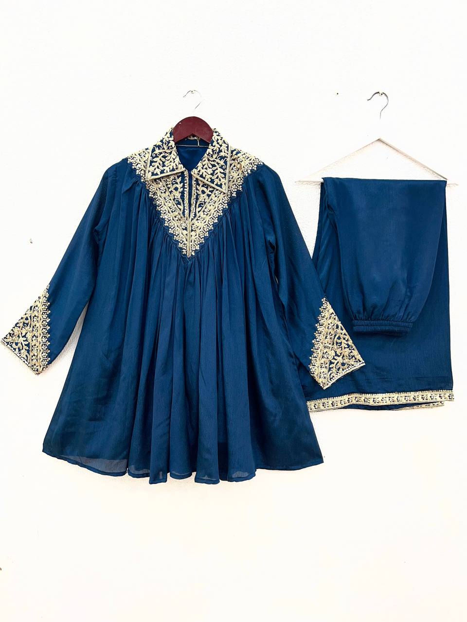 2-Piece Stylish Ensemble: Includes a well-fitted top and coordinated bottom single available wholesale