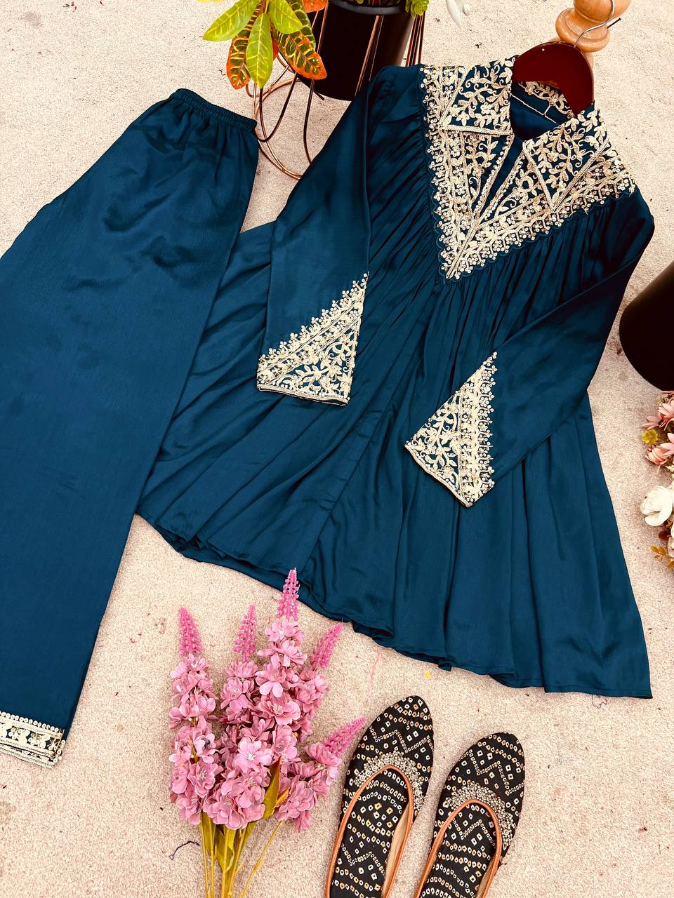 2-Piece Stylish Ensemble: Includes a well-fitted top and coordinated bottom single available wholesale