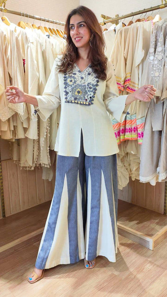 2-Piece Stylish Ensemble: Includes a well-fitted top and coordinated bottom single available wholesale