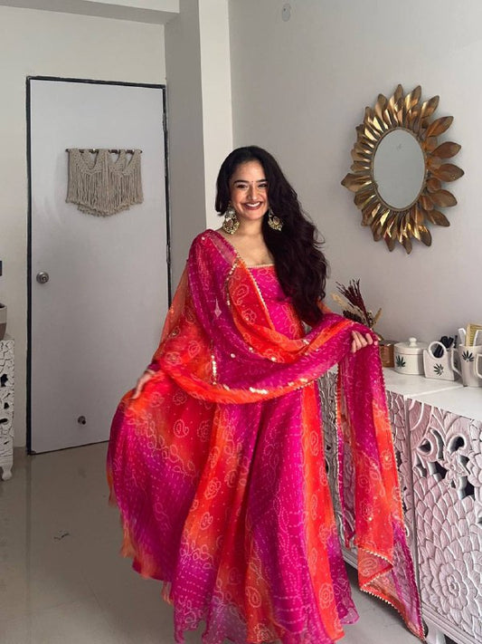 GOWN WITH  FAUX GEORGETTE FABRIC WITH PRINTED WORK WITH STITCHED PANT AND  DUPATTA single available wholesale