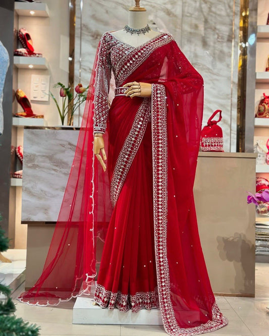 Fall in love with this stunning saree in an eye-catching shade, crafted with finesse and rich detailing. A perfect blend of grace and glam For *Karwa Chauth