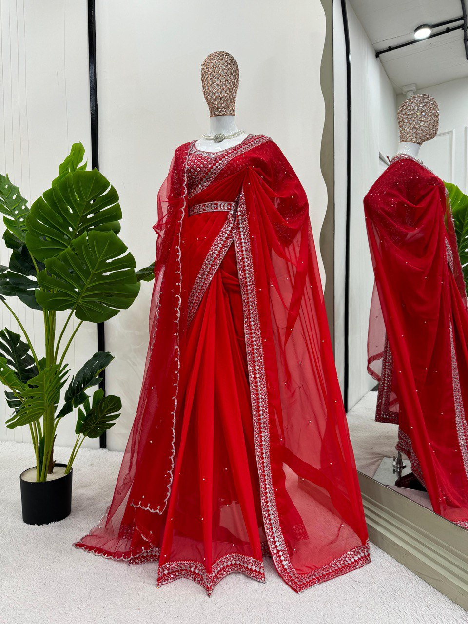 Fall in love with this stunning saree in an eye-catching shade, crafted with finesse and rich detailing. A perfect blend of grace and glam For *Karwa Chauth