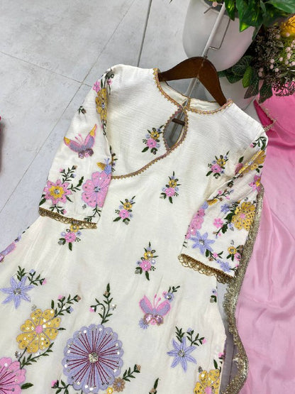 DESIGNER WEAR EMBROIDERED BOAT NECK TOP WITH TULIP SALWAAR PAIR