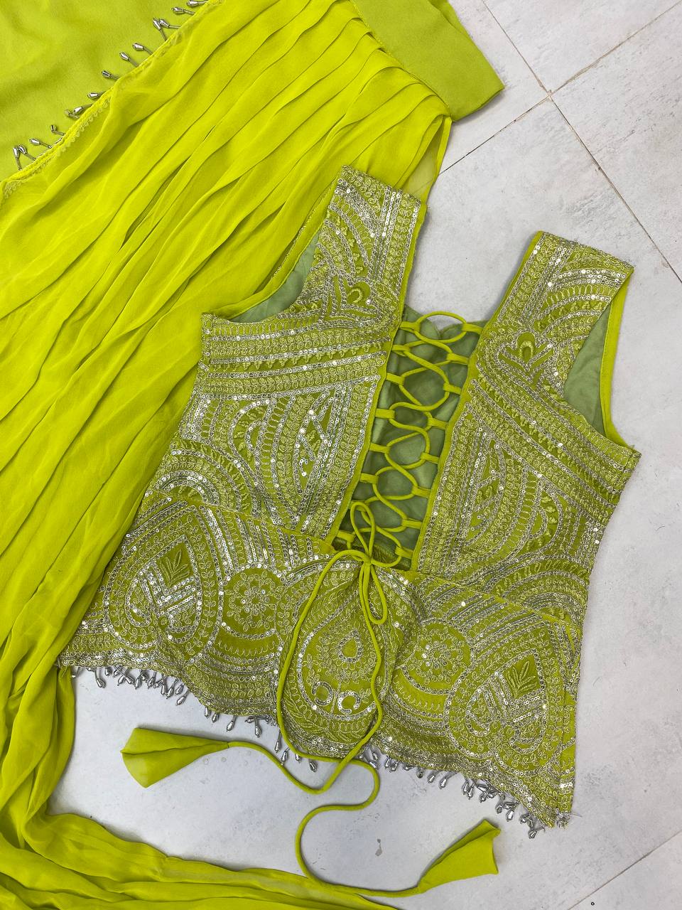 READY TO WEAR LEHENGA SAREE WITH SLEEVLESS  BLOUSE WITH BACK PATTERN AND SEQUENCE EMBROIDERY WORK