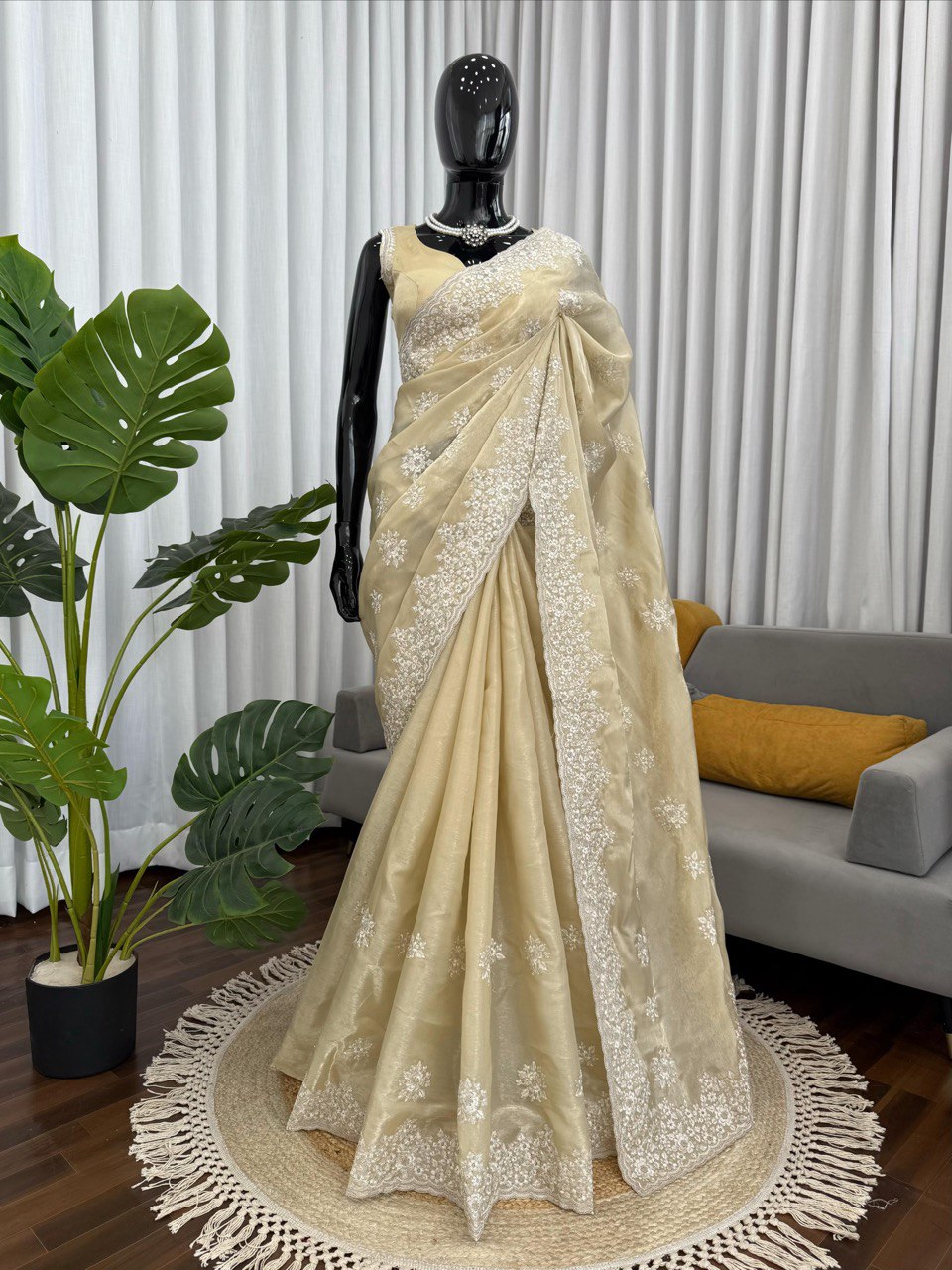 saree in an eye-catching shade, crafted with finesse and rich detailing. A perfect blend of grace and glam
