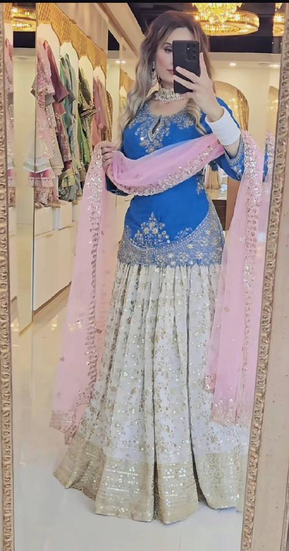 ĐĚSIGNER PARTY WEAR TOP AND LAHENGHA. WITH FANCY DUPPATA AND EMBROIDERY WORK