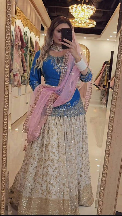 ĐĚSIGNER PARTY WEAR TOP AND LAHENGHA. WITH FANCY DUPPATA AND EMBROIDERY WORK
