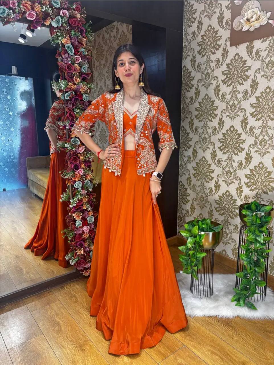 Experience effortless luxury with this premium Orange Lehenga choli With Heavy Traditional Jacket Expertly tailored with precise pleats and a refined finish, it delivers a sophisticated look without compromising comfort.