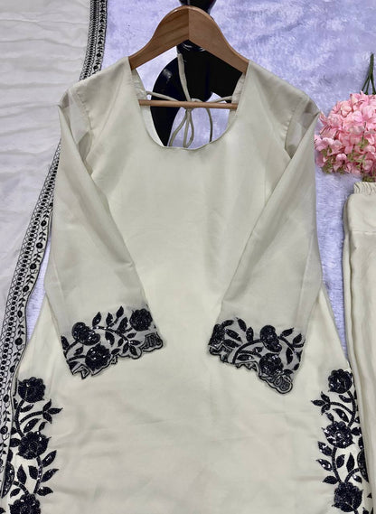 ĐĚSIGNER PARTY WEAR FARSI TOP AND SALVAR . WITH FANCY DUPPATA AND EMBROIDERY WORK