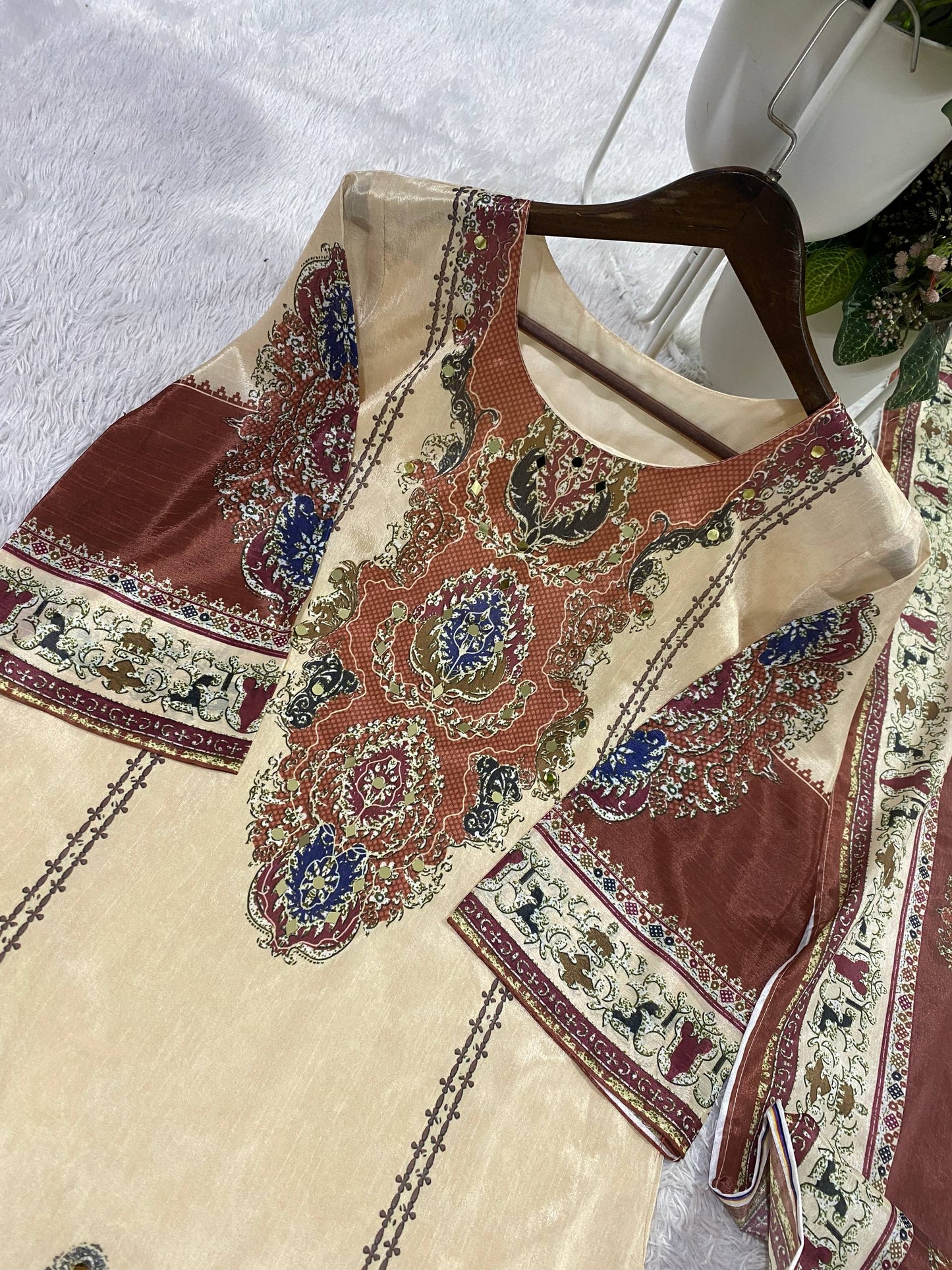 THIS WEDDING SEASON, TRY OUR DESIGNER PRINTED SUIT WITH LIGHT MIRROR WORK TOUCH-UP