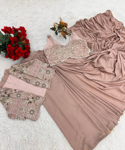 effortless luxury with this premium ready-to-wear saree. Expertly tailored with precise pleats and a refined finish, it delivers a sophisticated look without compromising comfort