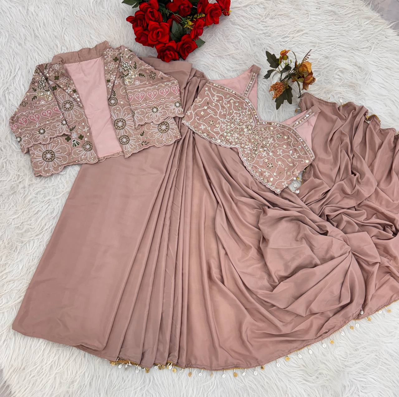 effortless luxury with this premium ready-to-wear saree. Expertly tailored with precise pleats and a refined finish, it delivers a sophisticated look without compromising comfort