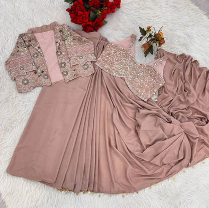 effortless luxury with this premium ready-to-wear saree. Expertly tailored with precise pleats and a refined finish, it delivers a sophisticated look without compromising comfort