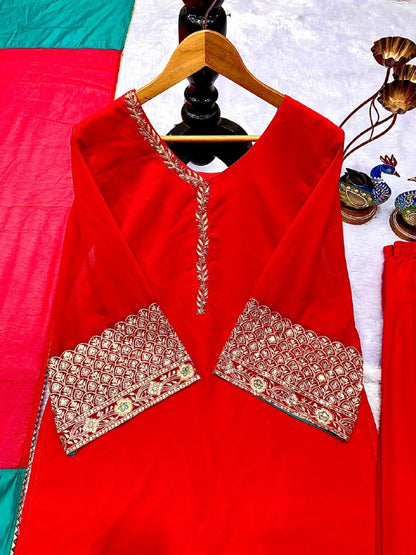 ĐĚSIGNER PARTY WEAR FARSI TOP AND SALVAR . WITH FANCY DUPPATA AND EMBROIDERY WORK