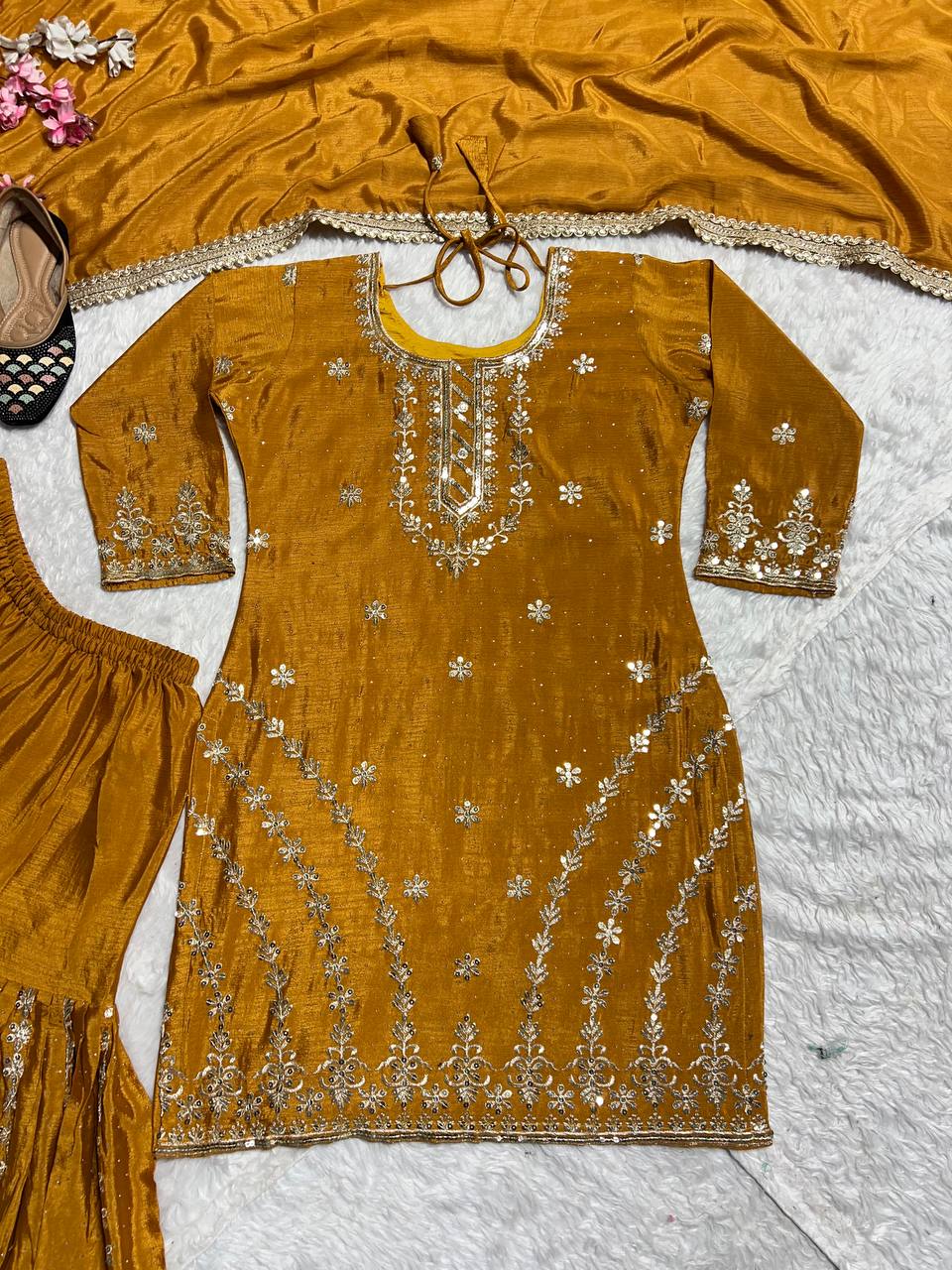 Pure Heavy Chinnon Silk With Heavy Embroidery Work With Fancy Borders Less Work Sleeve With Fancy Latkan Dori.
