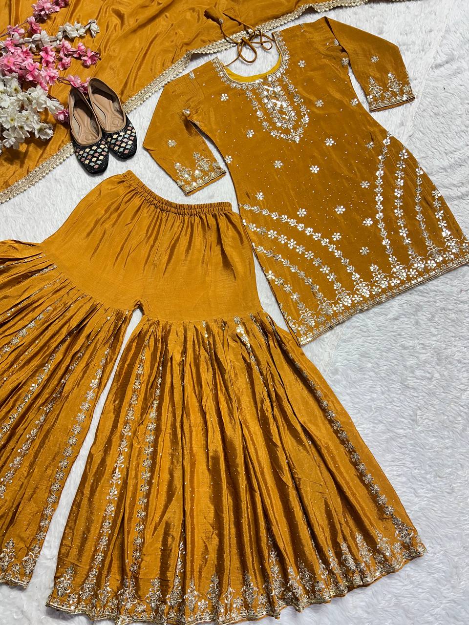 Pure Heavy Chinnon Silk With Heavy Embroidery Work With Fancy Borders Less Work Sleeve With Fancy Latkan Dori.
