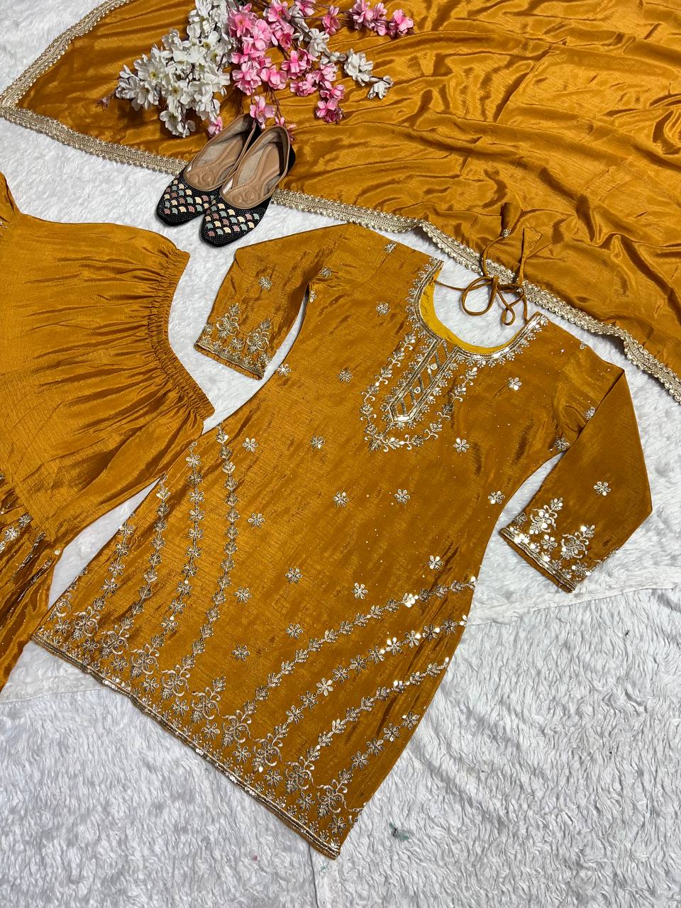 Pure Heavy Chinnon Silk With Heavy Embroidery Work With Fancy Borders Less Work Sleeve With Fancy Latkan Dori.
