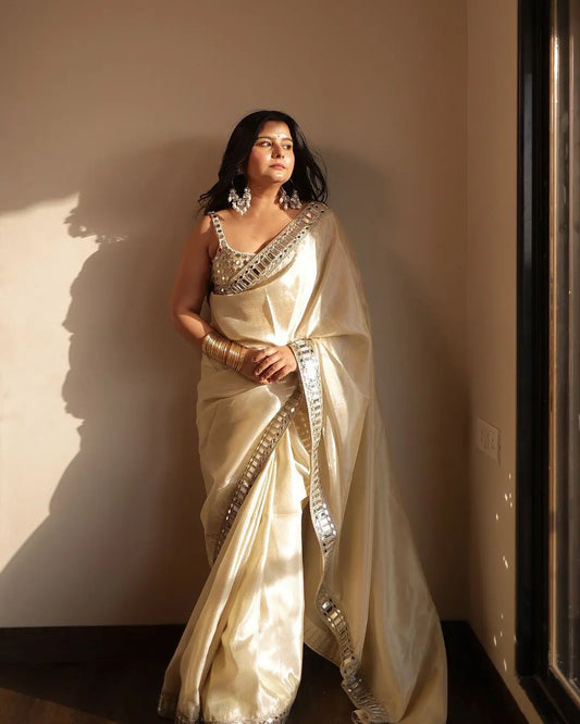 Sift satin Organza saree which is embedded with real mirror work Embroidery
