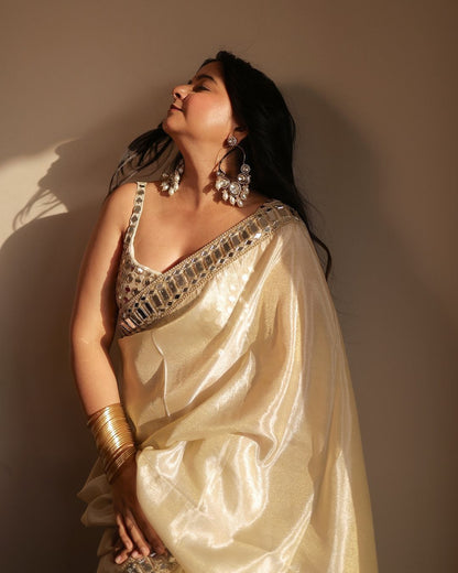 Sift satin Organza saree which is embedded with real mirror work Embroidery