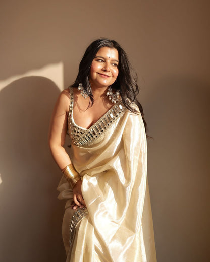 Sift satin Organza saree which is embedded with real mirror work Embroidery