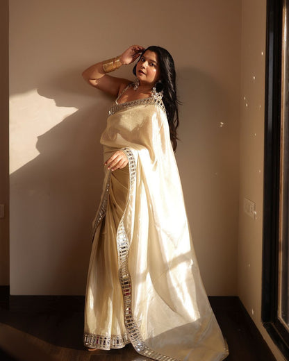 Sift satin Organza saree which is embedded with real mirror work Embroidery